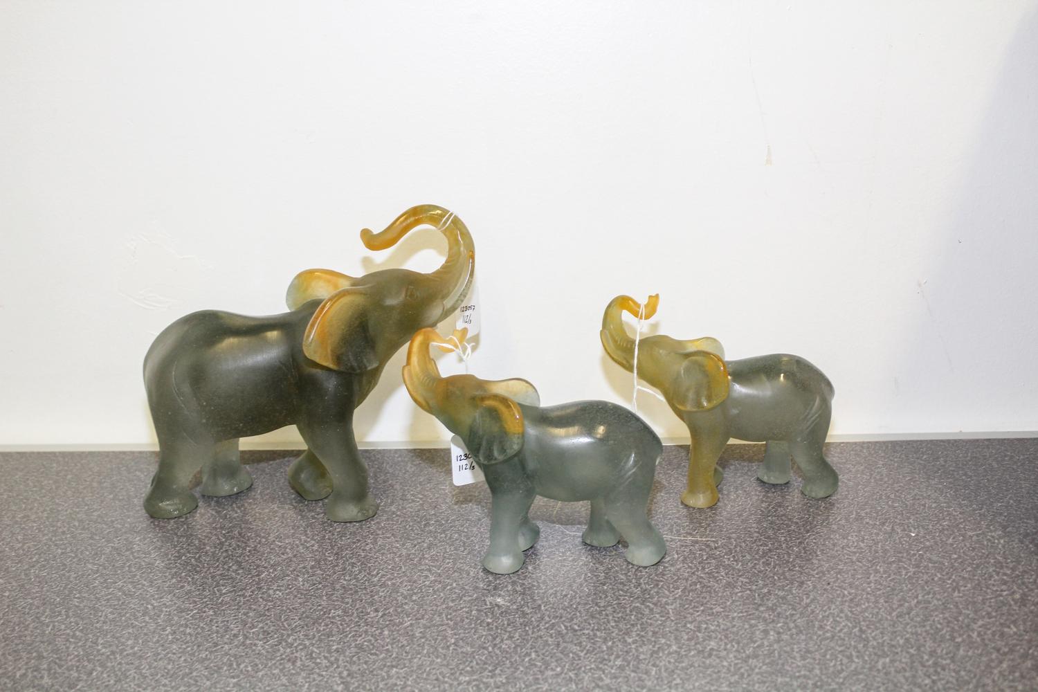 A Group of Three Daum Pate de Verre Elephant Figures Height of tallest 7 7/8 inches.
