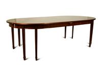 A George III Style Mahogany Dining Table — 19TH CENTURY