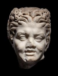 A Roman Marble Satyr Head