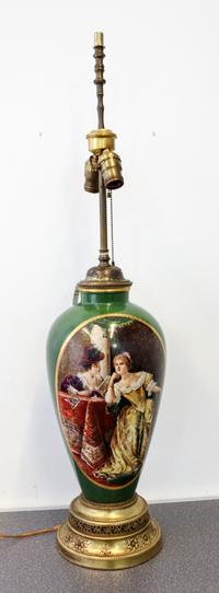 A Continental Porcelain Lamp Height overall 36 inches. — 20TH CENTURY