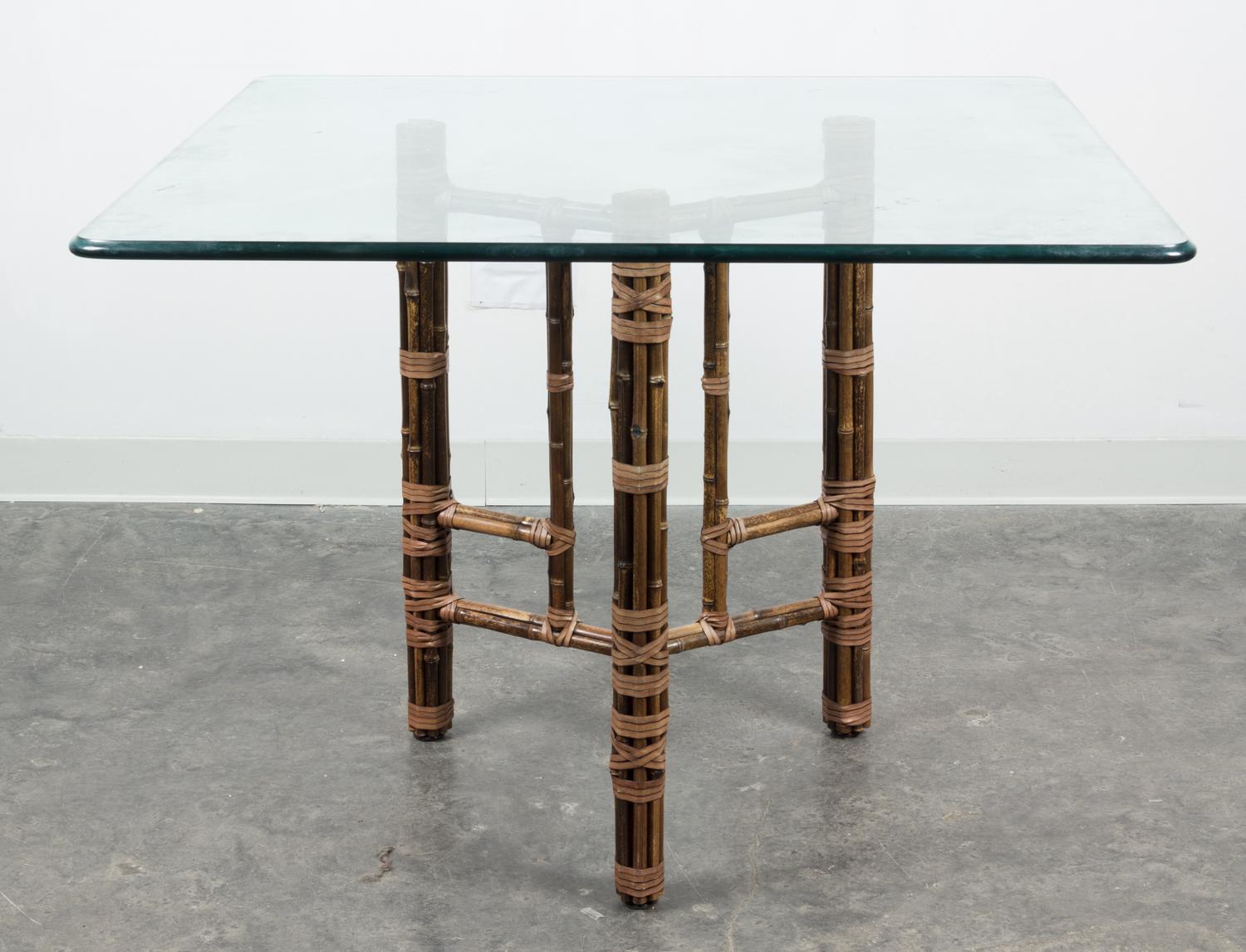 An American Bamboo and Rattan Table and Chairs Height of chairs 34 inches. — MCGUIRE FURNITURE CO.