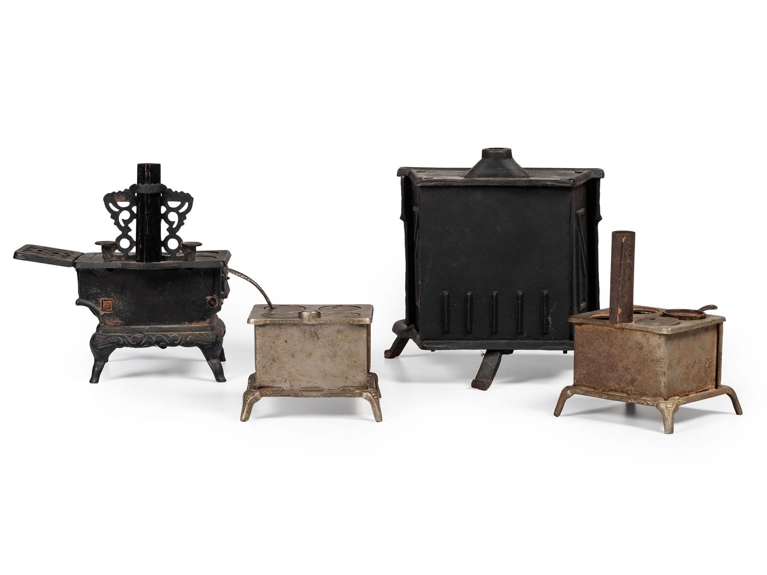 Four Salesman's Sample or Child's Toy Cast Iron Stoves