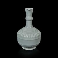 A Chinese "claire de lune" or pale celadon-glazed pouring vessel, Huajiao 粉青釉花浇
