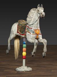 A Herschell-Spillman Carved and Painted Wood Carousel Horse