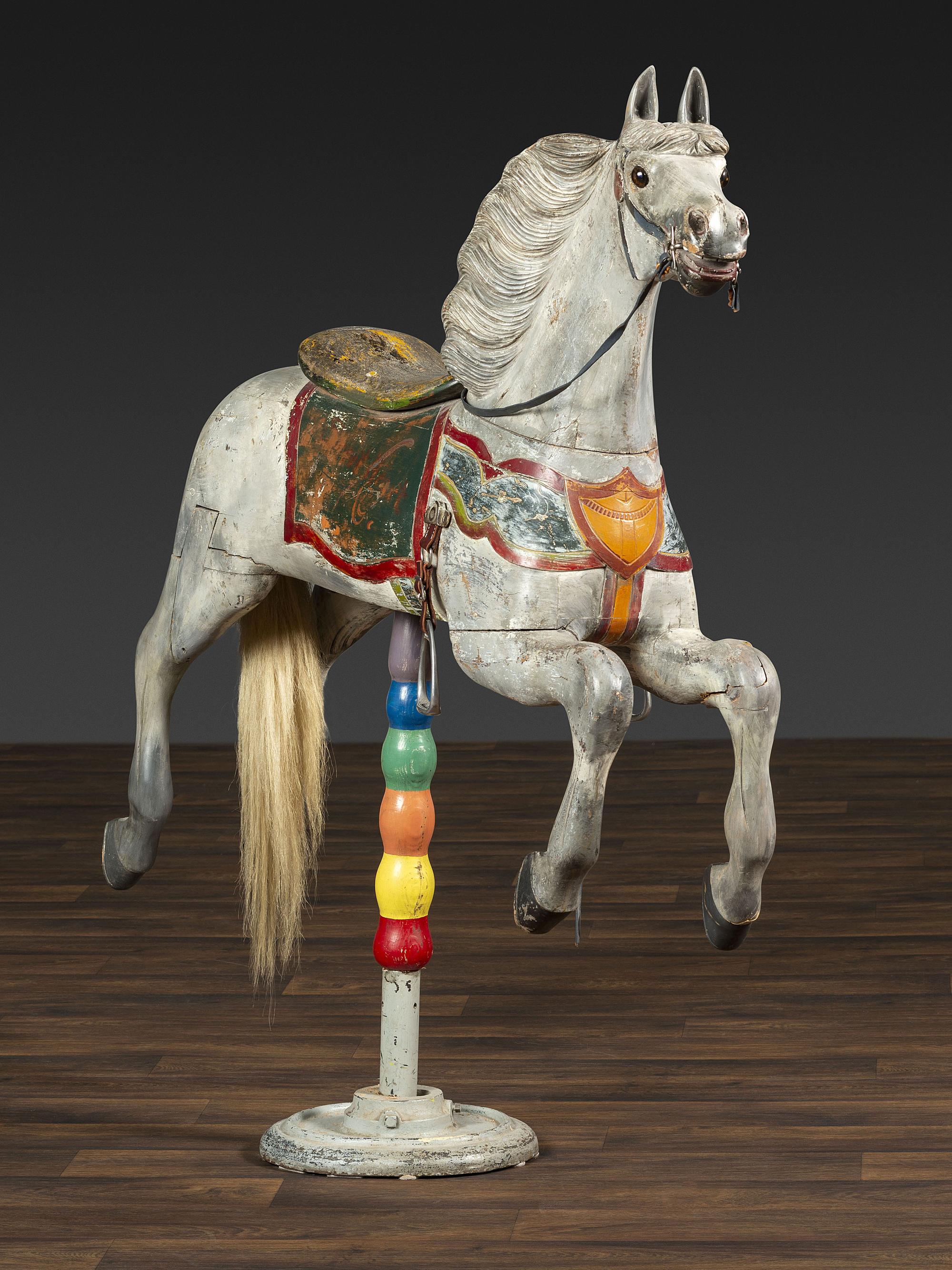 A Herschell-Spillman Carved and Painted Wood Carousel Horse
