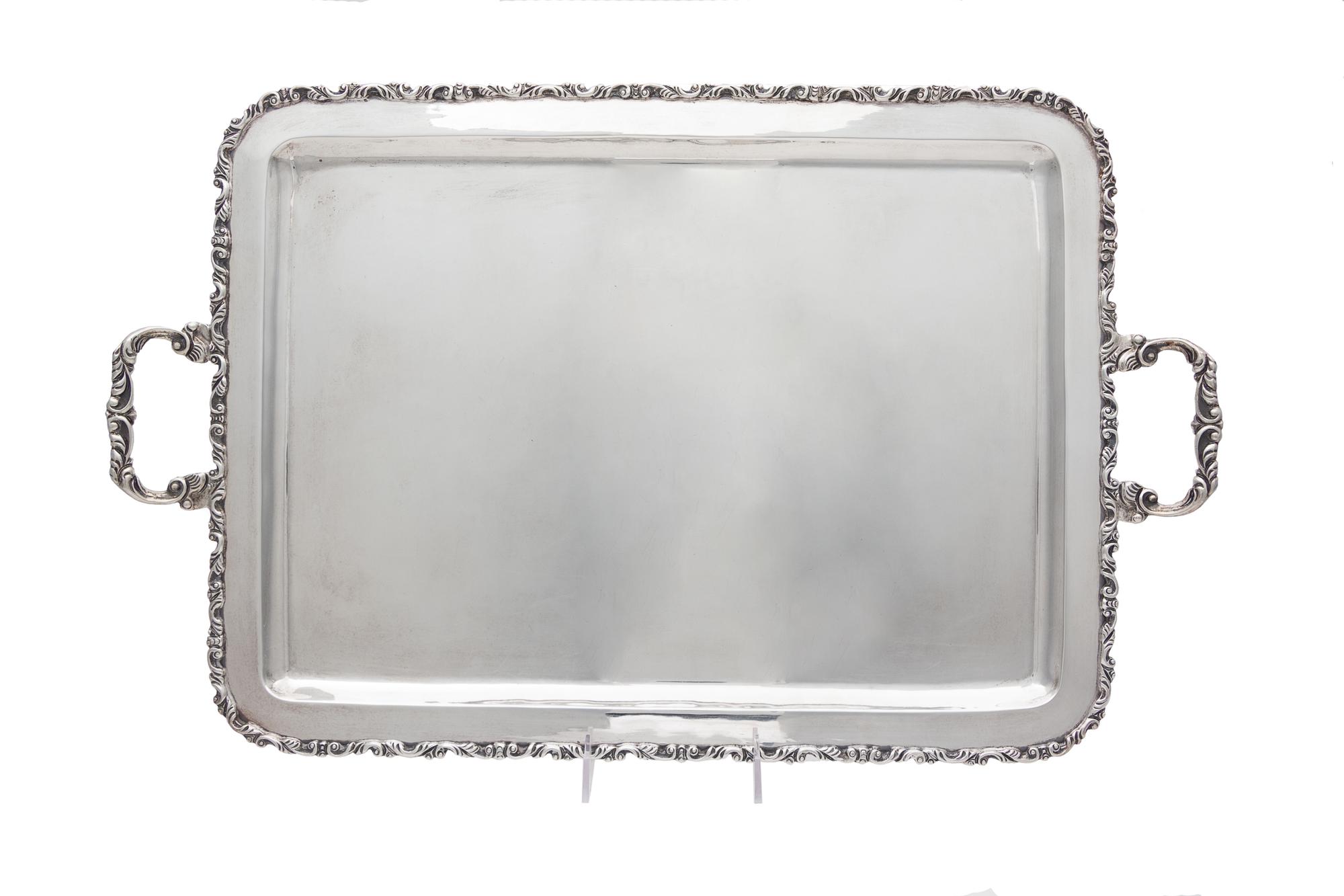 A Mexican Silver Tray, Juvento Lopez Reyes, Mexico City, Mid-20th Century, of rectangular form, the rim and handles worked to show S-sc