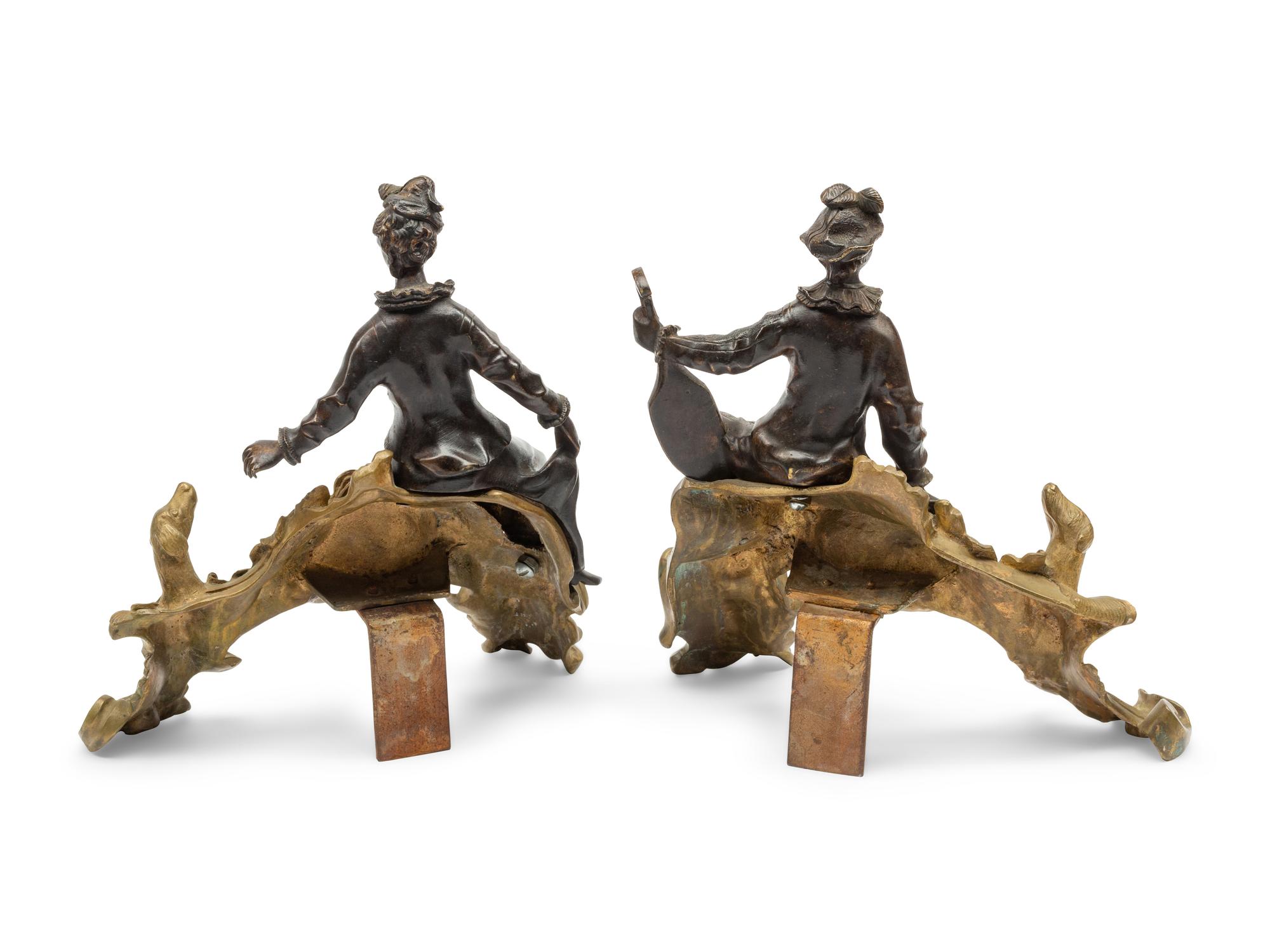 A Pair of Louis XV Style Gilt and Patinated Bronze Figural Chenets
