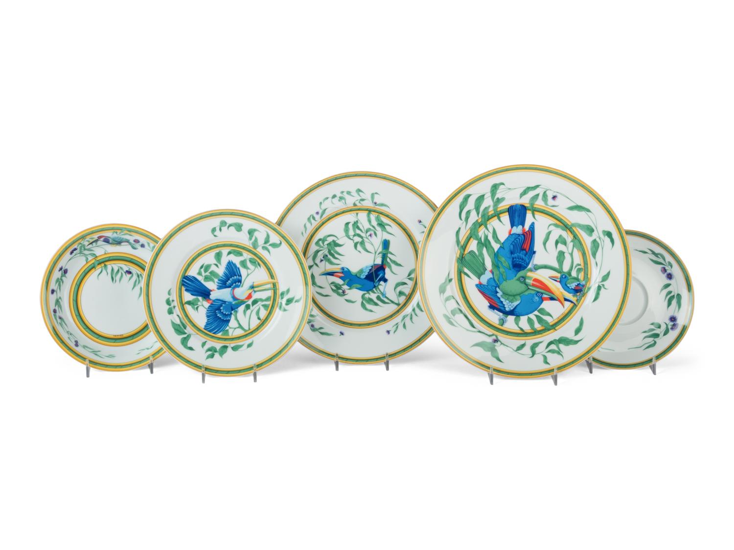 An Hermès Toucans Porcelain Dinner Service
