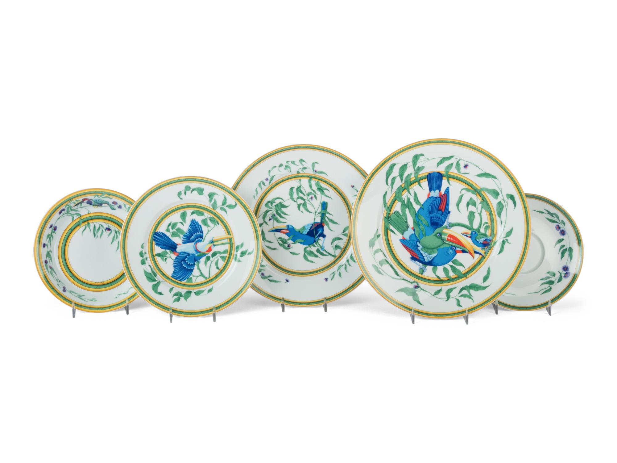 An Hermès Toucans Porcelain Dinner Service