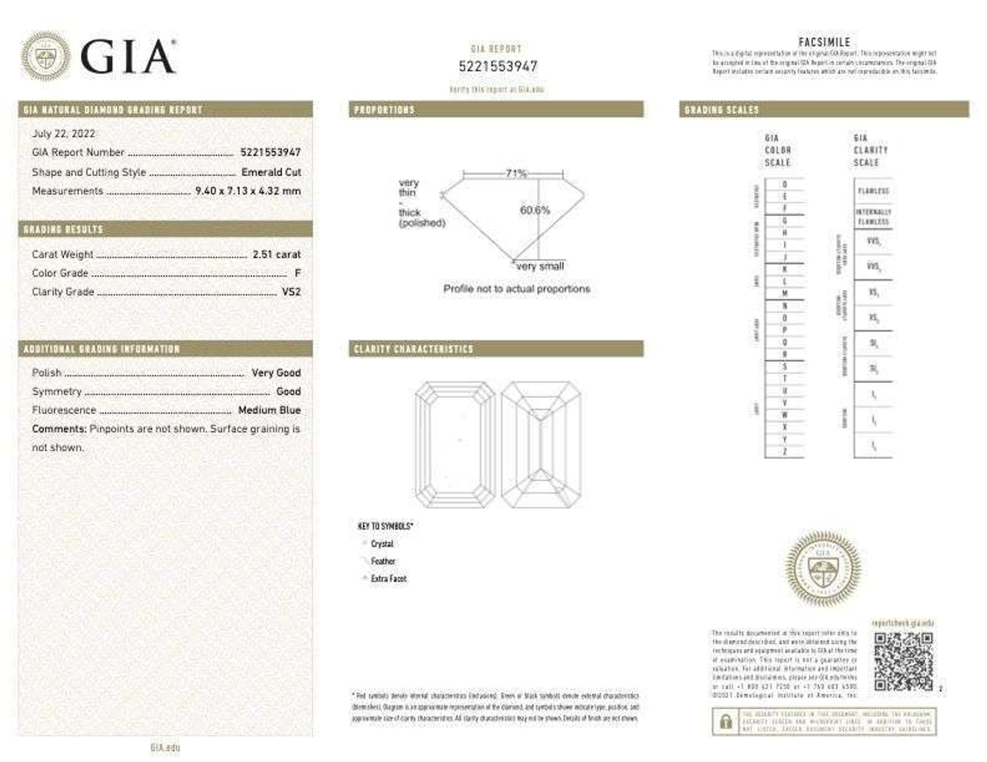 An emerald-cut diamond accented solitaire ring