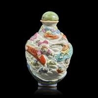 An Unusual Chinese Enameled Molded Porcelain Snuff Bottle, Qianlong Mark