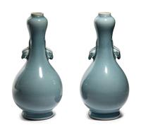A Pair of Clair-de-Lune Glazed Porcelain 'Garlic Head' Bottle Vases