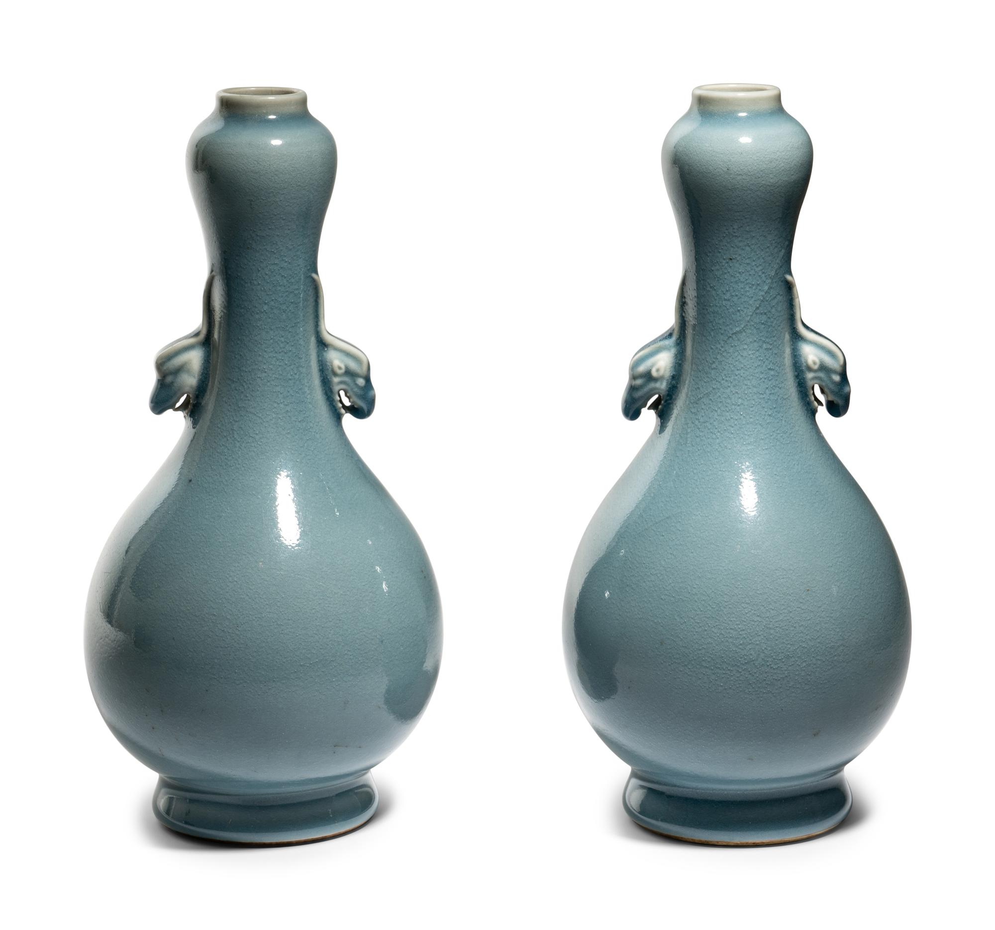 A Pair of Clair-de-Lune Glazed Porcelain 'Garlic Head' Bottle Vases