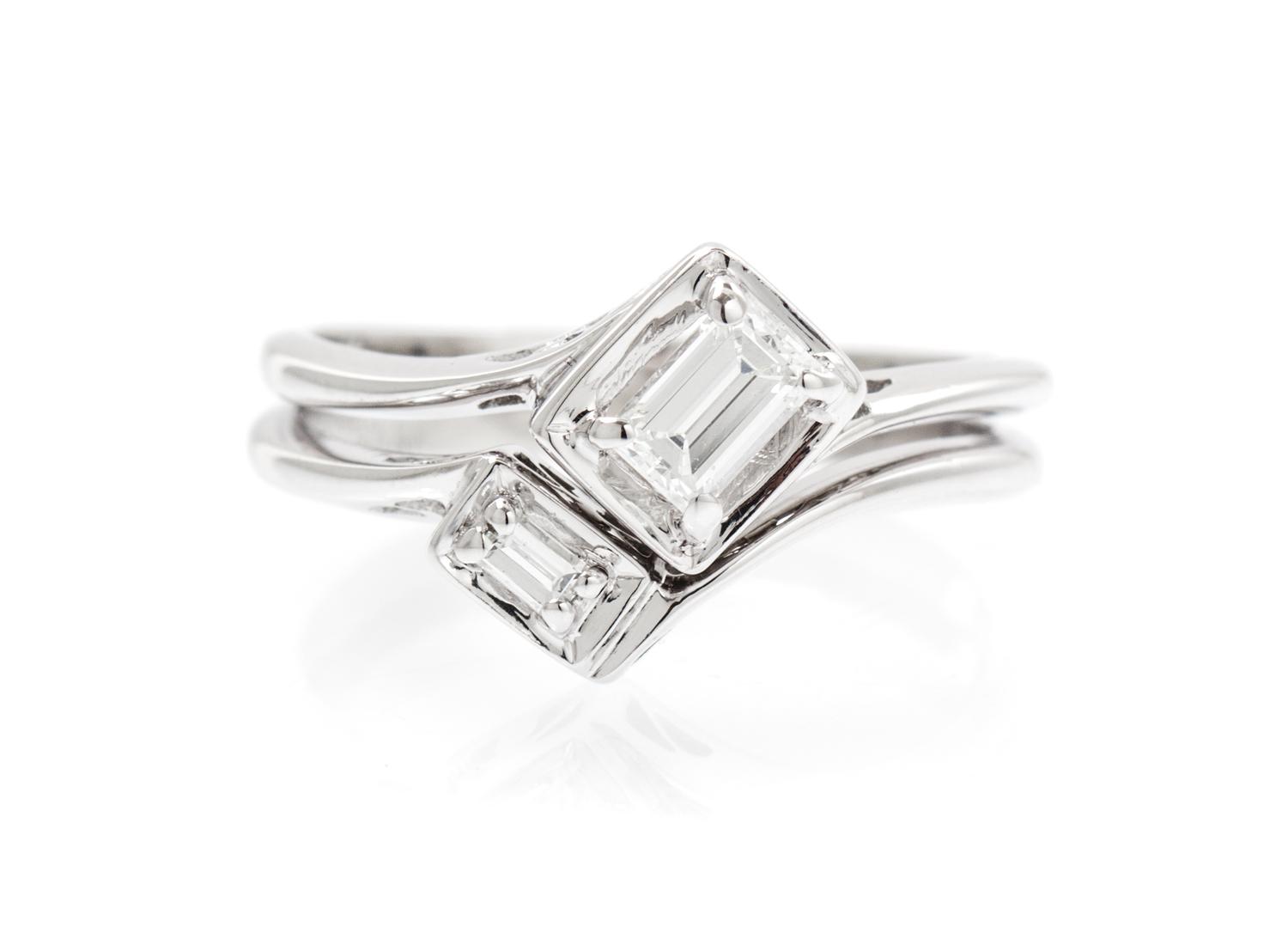 A 14 Karat White Gold and Diamond Ring, 2.10 dwts.
