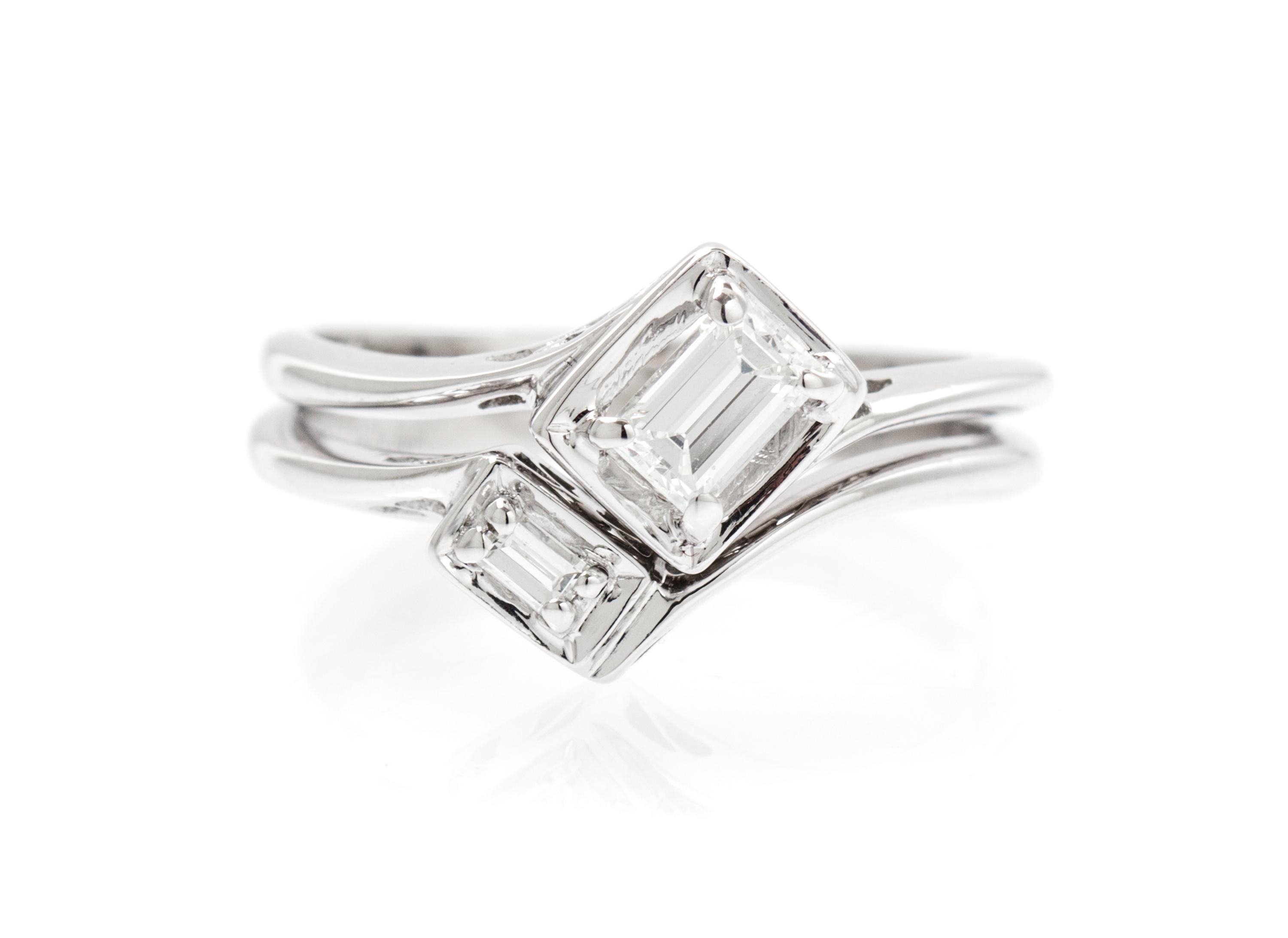 A 14 Karat White Gold and Diamond Ring, 2.10 dwts.