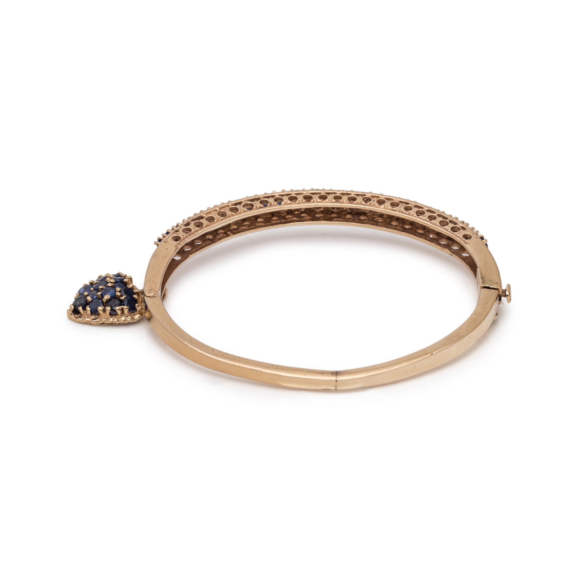 YELLOW GOLD AND SAPPHIRE BANGLE BRACELET