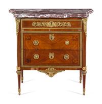 A Louis XVI Gilt Bronze Mounted Tulipwood Commode with an Unassociated Marble Top