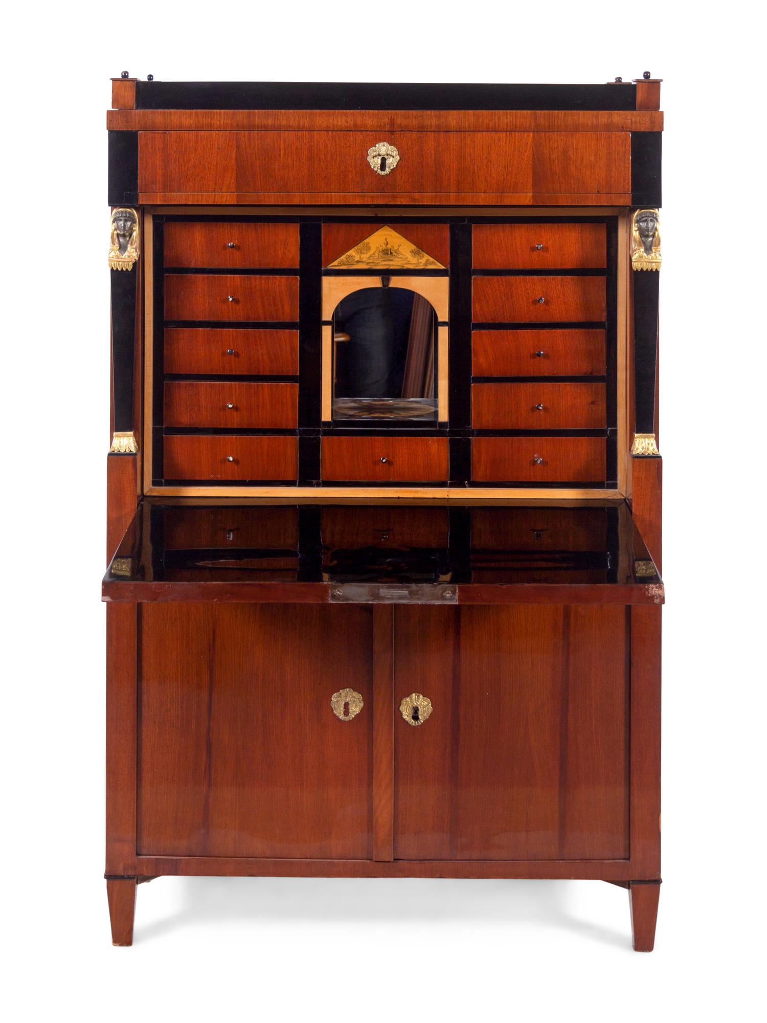 An Austrian Empire Parcel Ebonized and Gilt Mahogany Secrétaire à Abattant