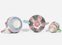 Two Chinese export famille rose porcelain teapots, a stand and a teacup, Yongzheng to early Qianlong period 粉彩茶壺兩件 及座子和茶杯 清 雍正至乾隆