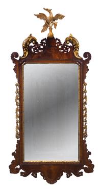 A Chippendale Style Parcel Gilt Mahogany Mirror Height 50 x width 24 inches. — 20TH CENTURY
