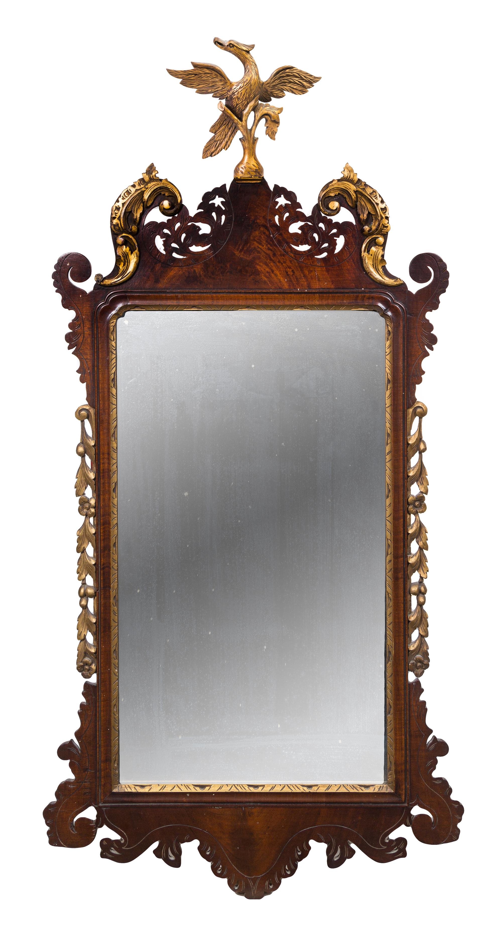 A Chippendale Style Parcel Gilt Mahogany Mirror Height 50 x width 24 inches. — 20TH CENTURY