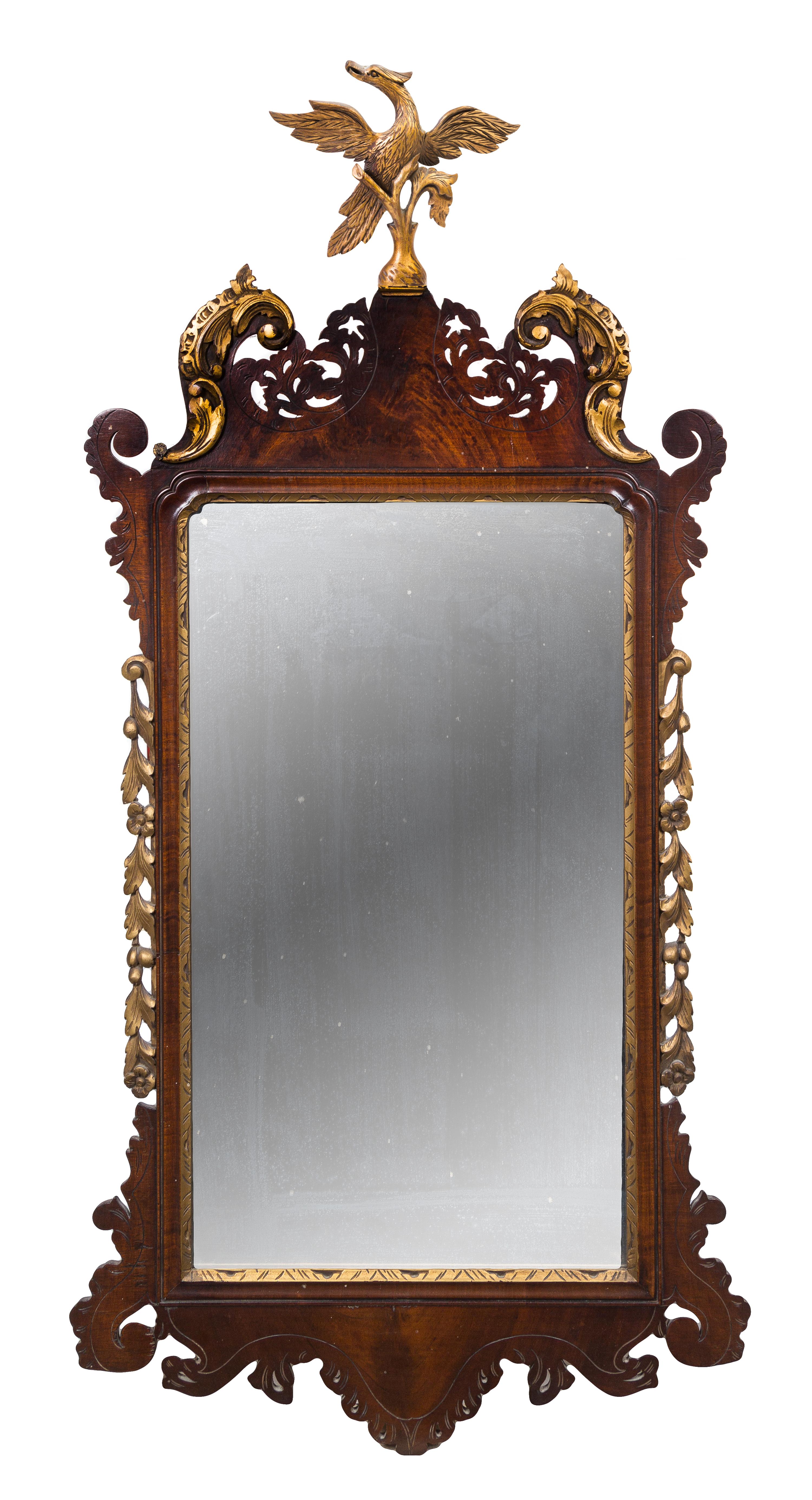 A Chippendale Style Parcel Gilt Mahogany Mirror Height 50 x width 24 inches. — 20TH CENTURY