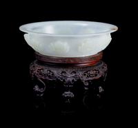 A Carved Jade Bowl Diameter 5 1/2 inches.