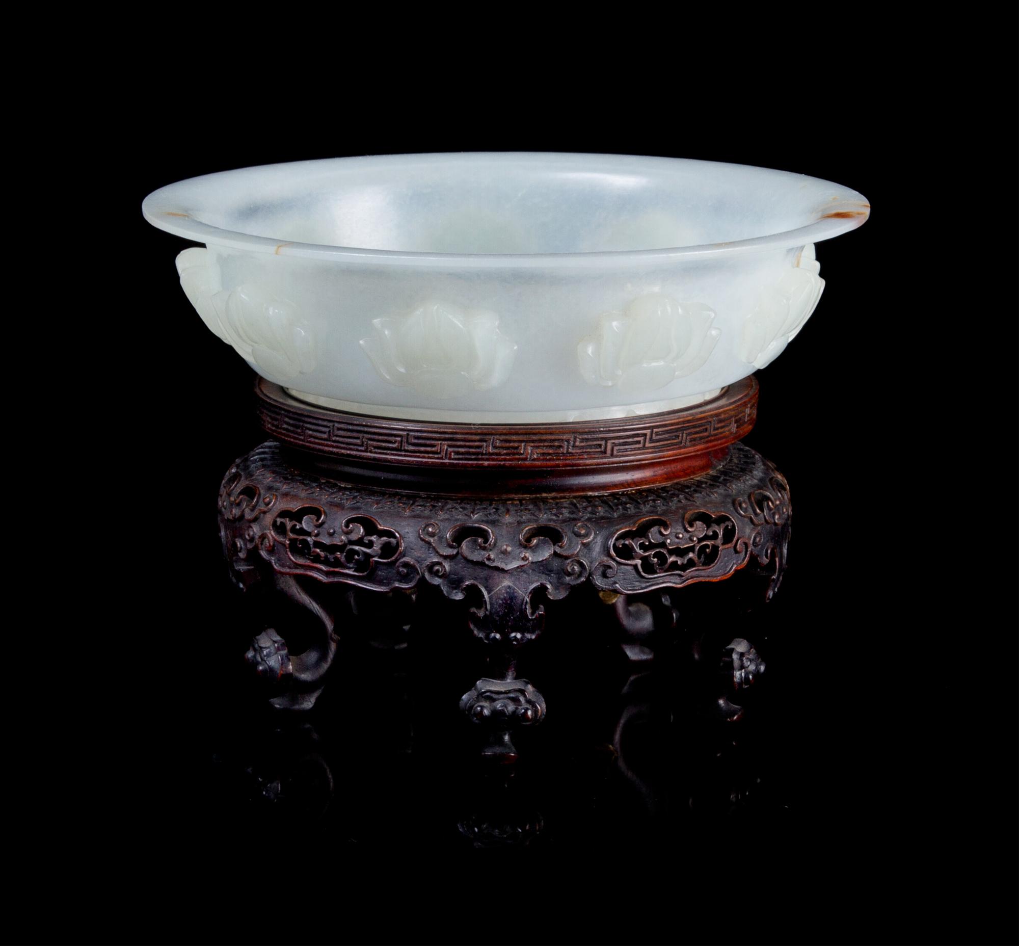 A Carved Jade Bowl Diameter 5 1/2 inches.