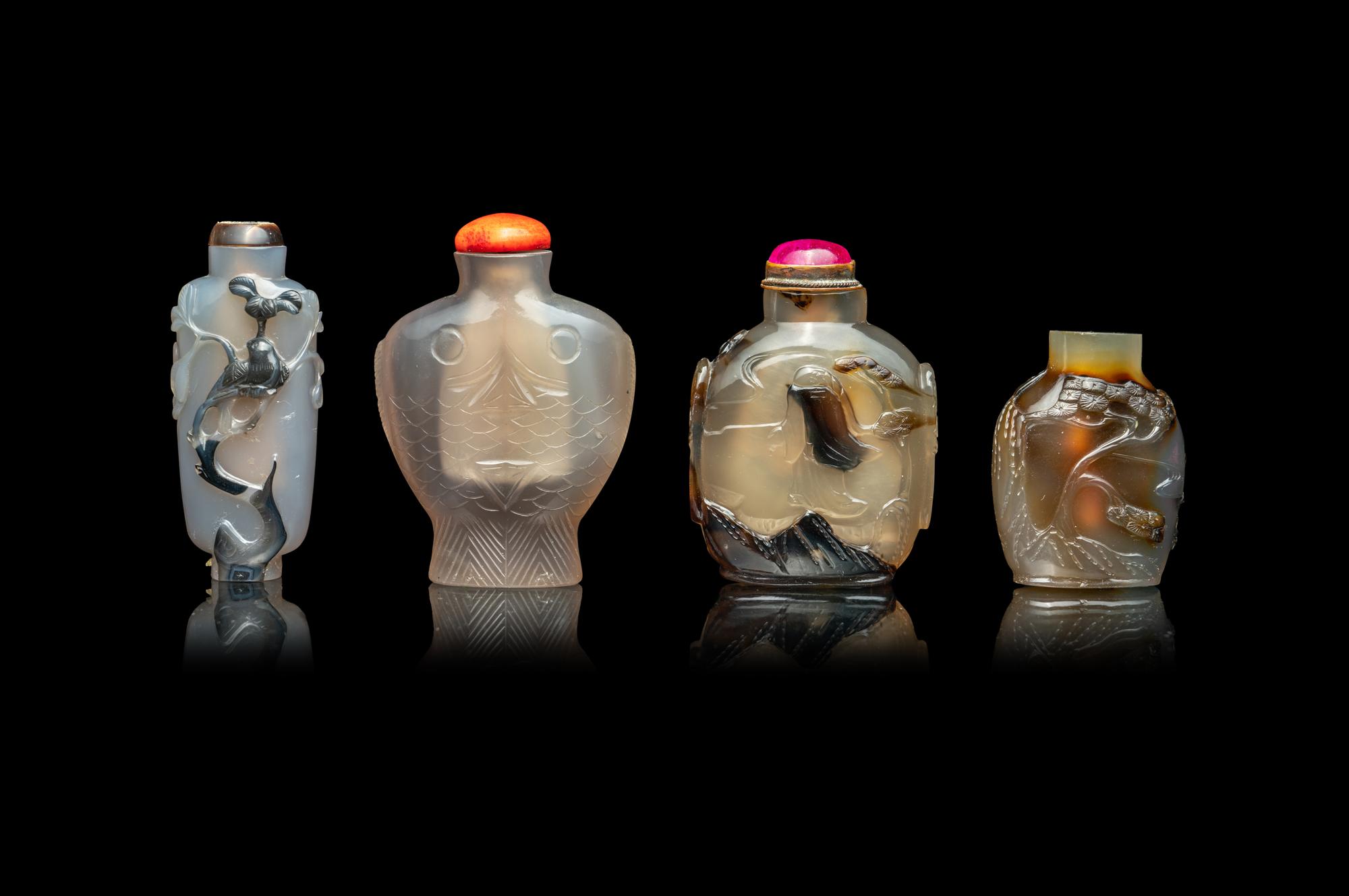 Four Chinese Carved Grey Agate Snuff Bottles