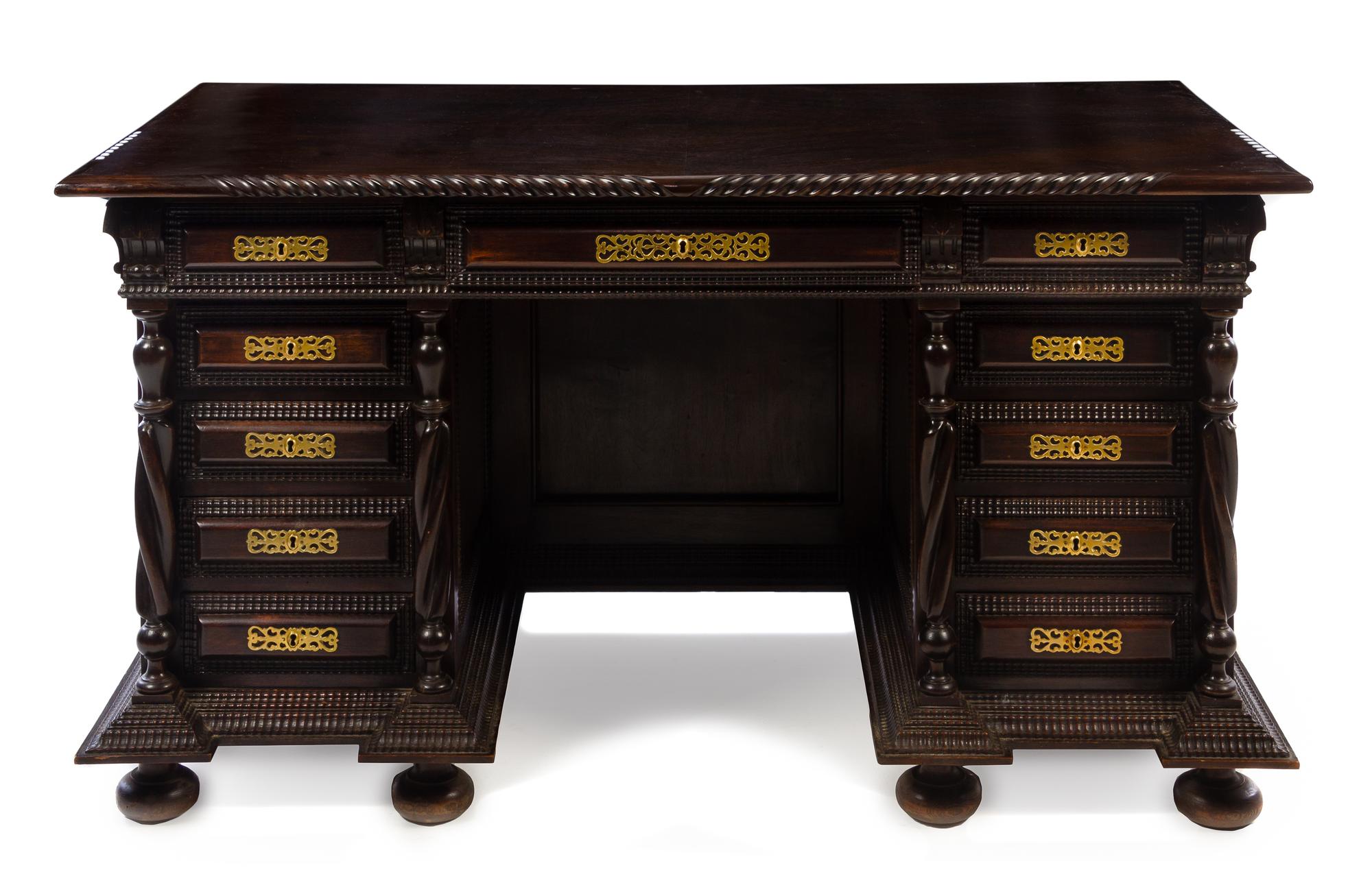 A Portuguese Brass Mounted Pedestal Desk Height 31 x width 58 1/2 x depth 31 1/2 inches. — 20TH CENTURY