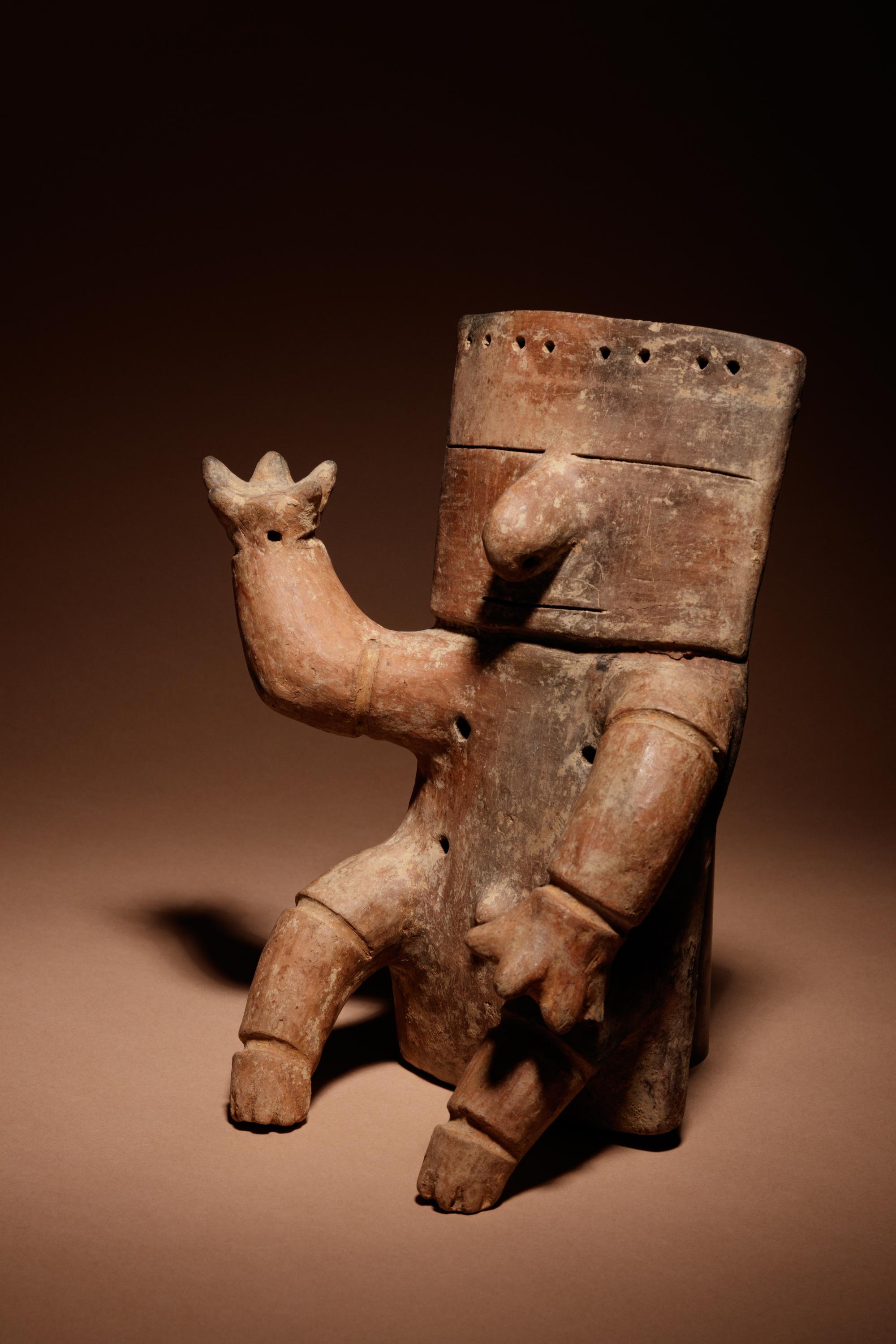A Quimbaya Terracotta Seated Figure
