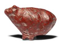 An Egyptian Red Jasper Trussed Ox