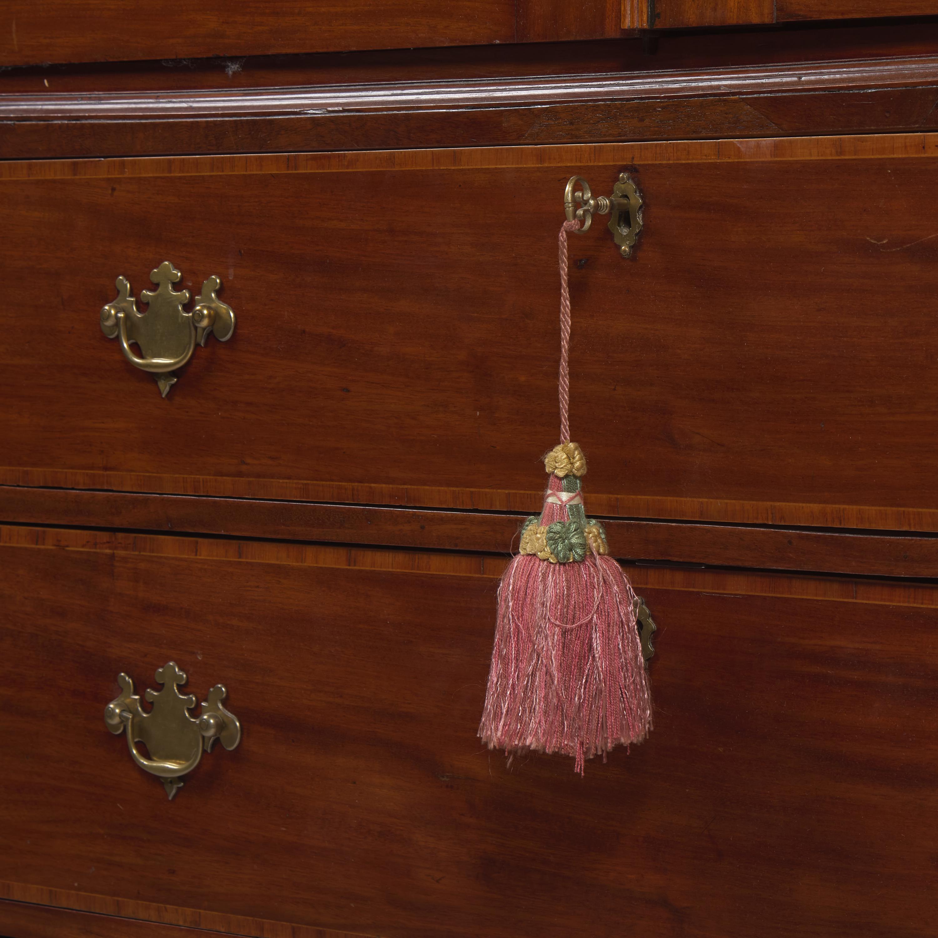 A Regency Inlaid Mahogany Linen Press