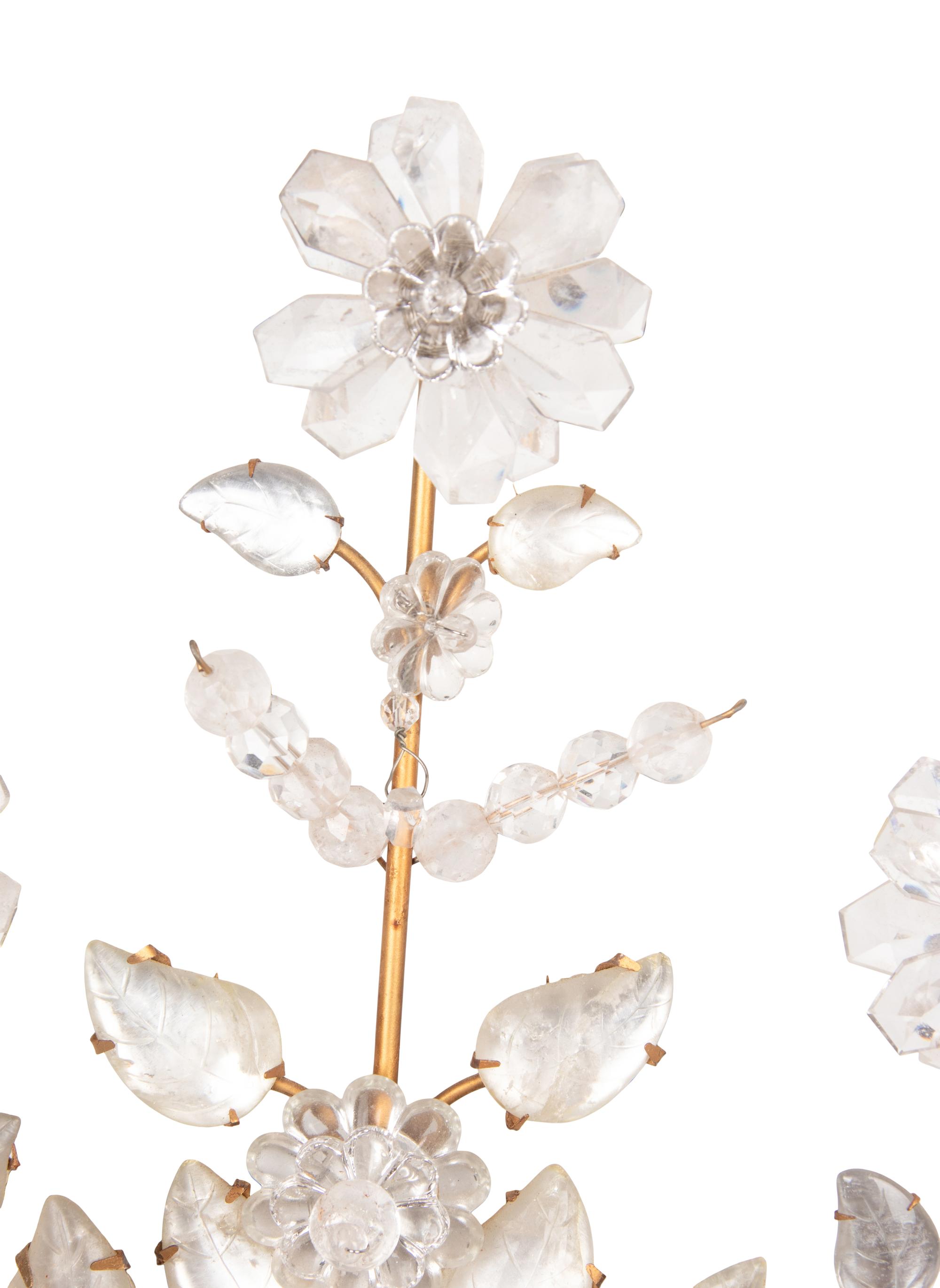 A Pair of Gilt Metal and Rock Crystal Three-Light Sconces
