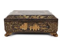 An English Chinoiserie Black and Gilt Laquer Game Box