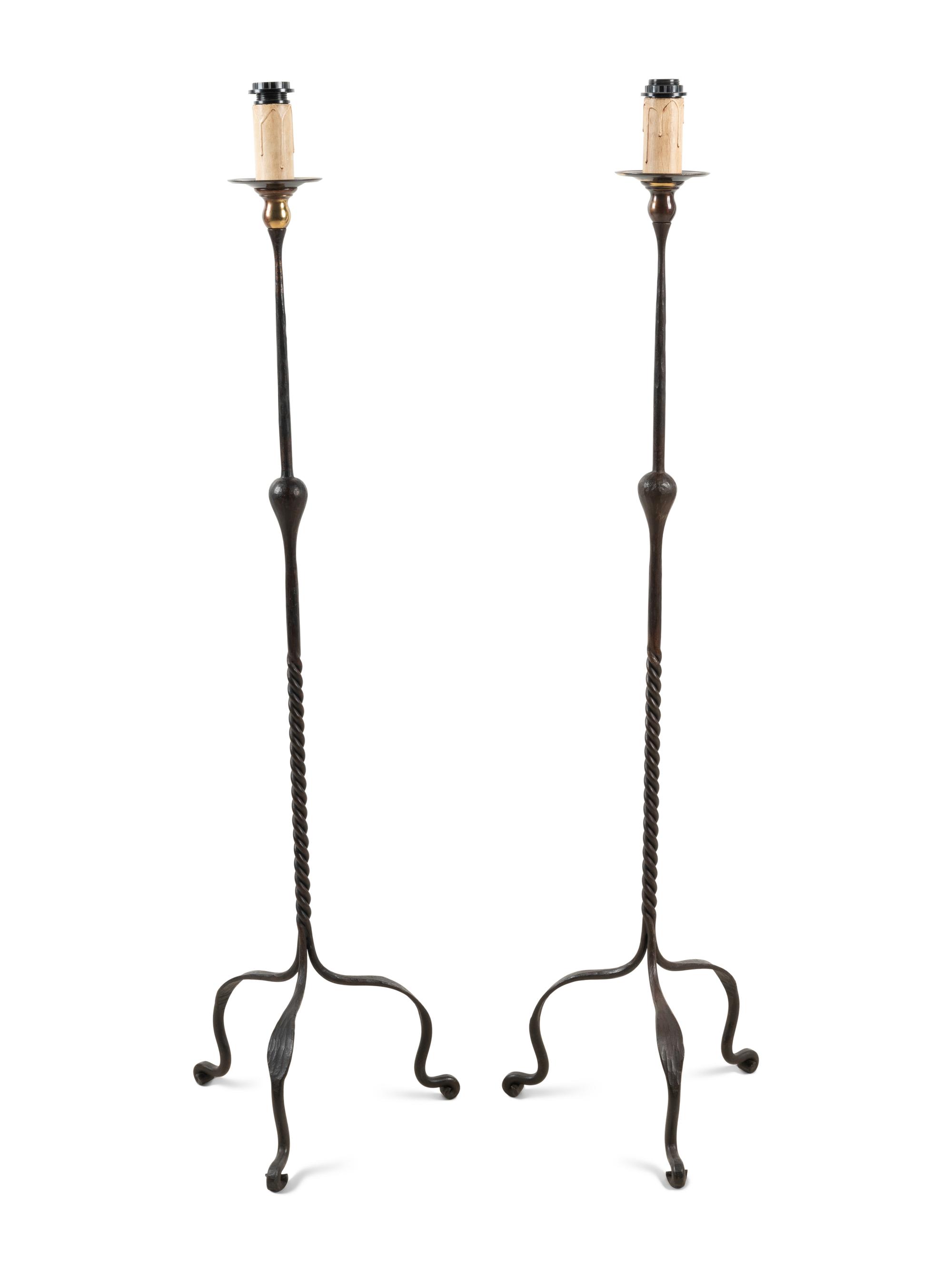 A Pair of Wrought Iron Floor Lamps