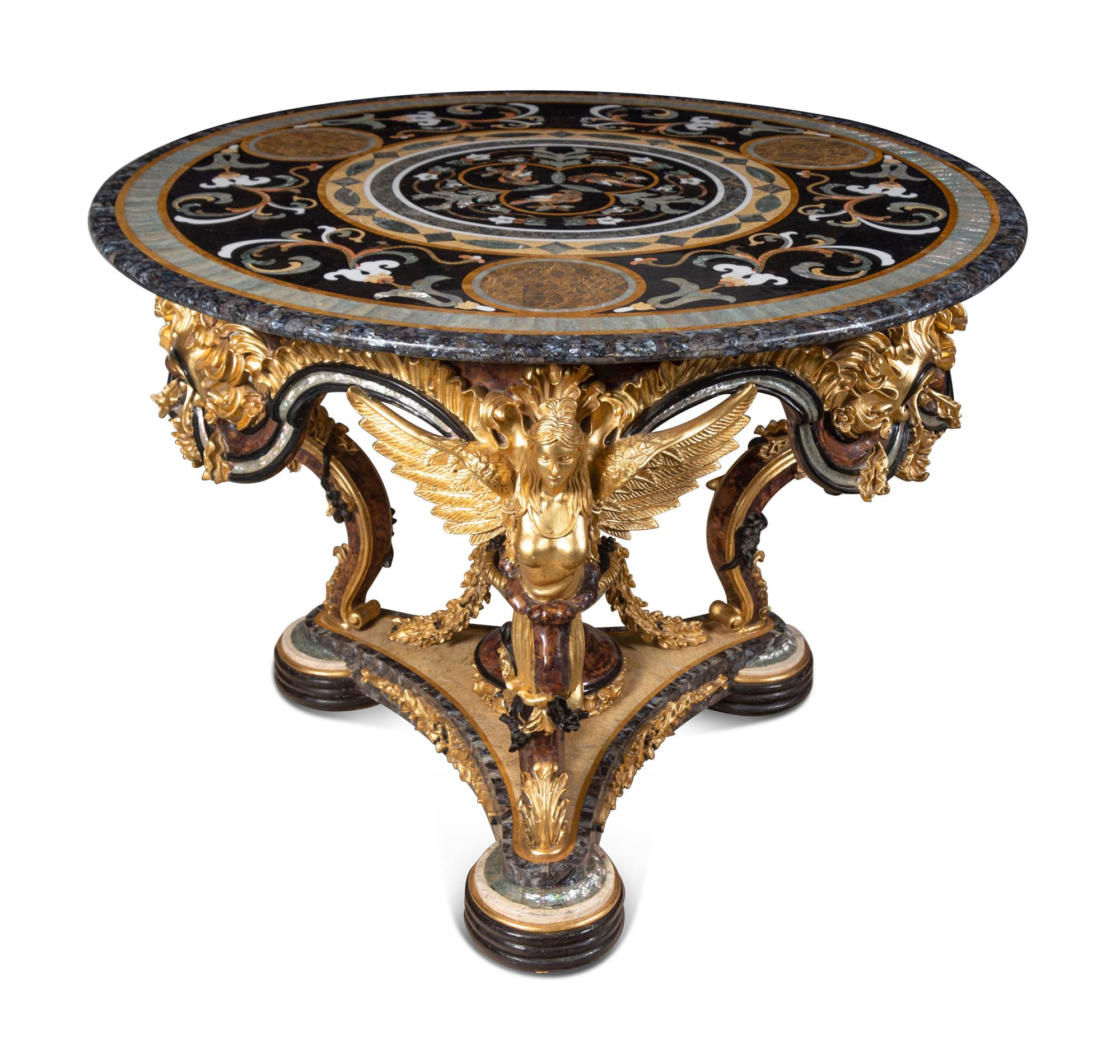 A Continental Parcel Gilt and Ebonized, Pietra Dura and Abalone Inlaid Center Table