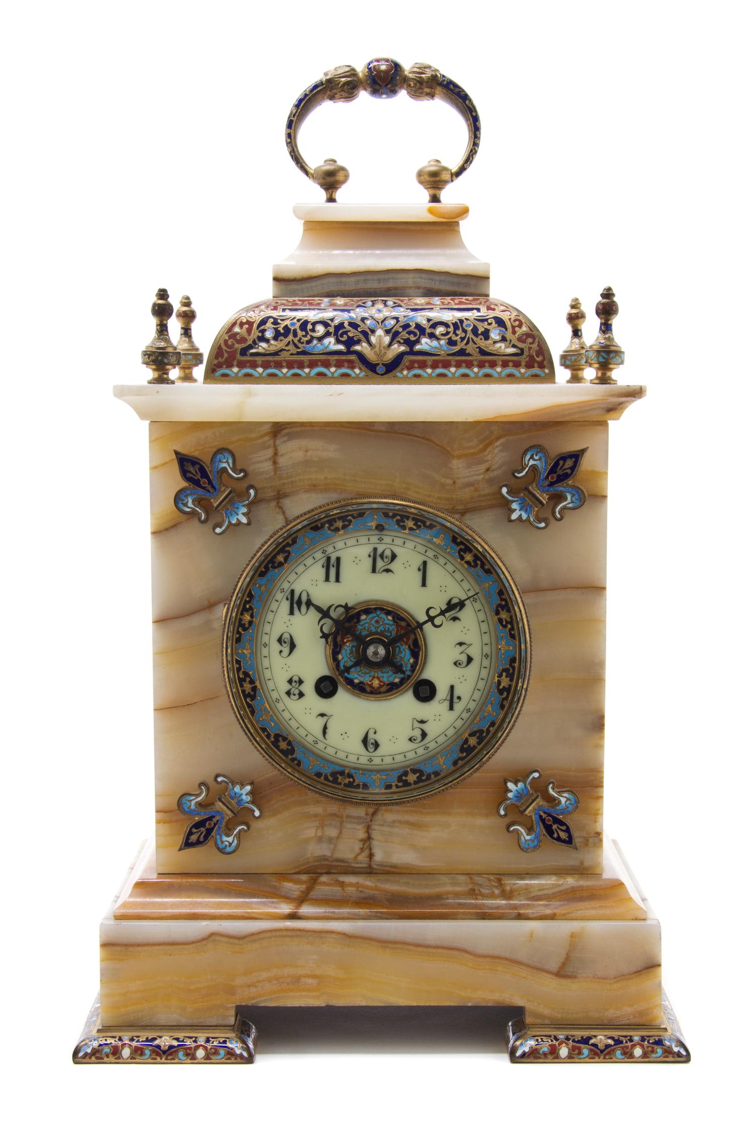 A French Champleve and Onyx Mantel Clock, Height overall 55 1/4 x height of clock 15 1/4 inches.