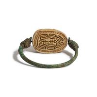 An Egyptian Bronze and 'Hyksos' Scarab Swivel Ring