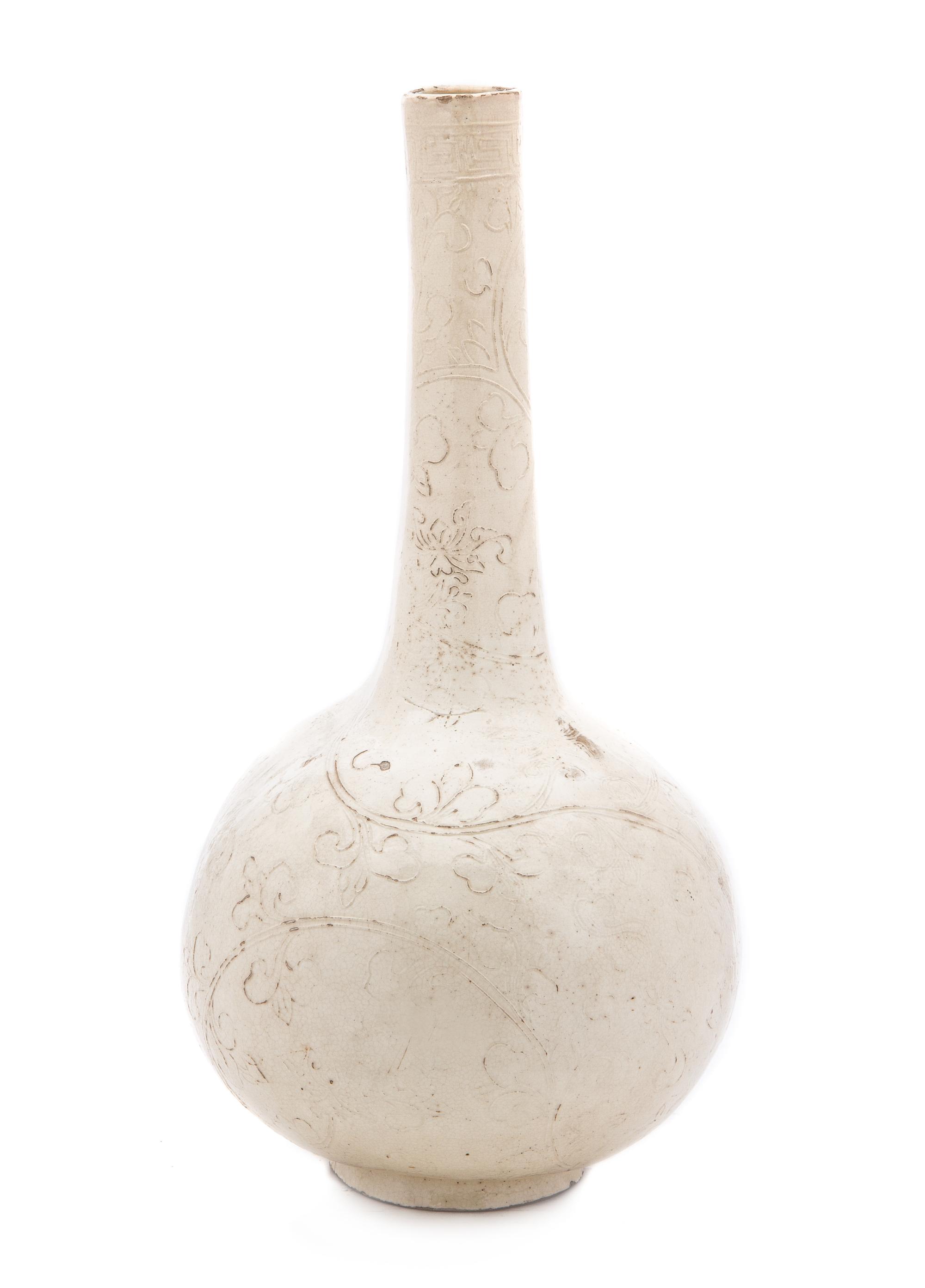A Chinese Dingyao Molded Porcelain Vase SONG DYNASTY Height 15 1/8 inches. — SONG DYNASTY