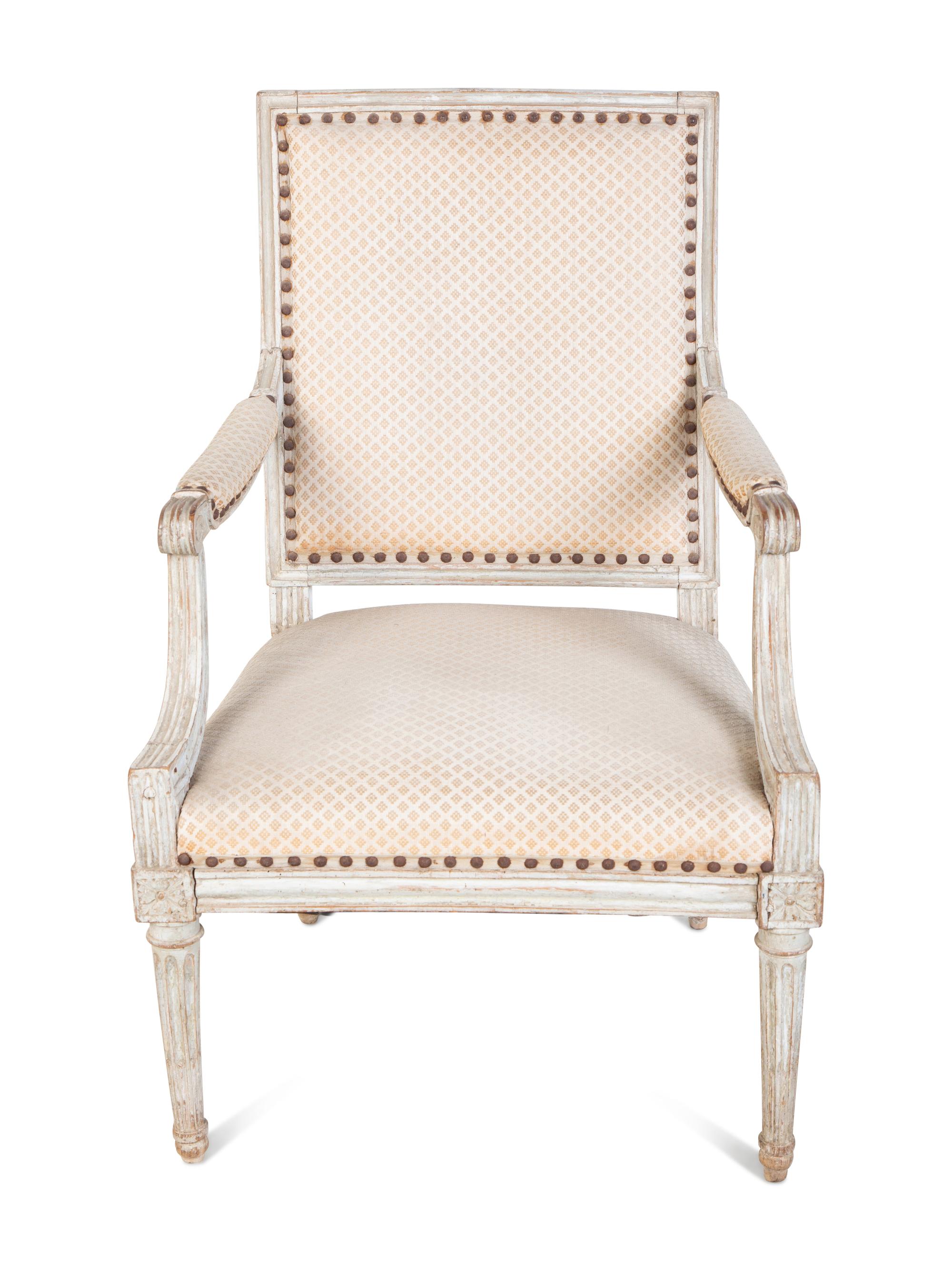 A Louis XVI Style Carved and Painted Fauteuil — 20TH CENTURY