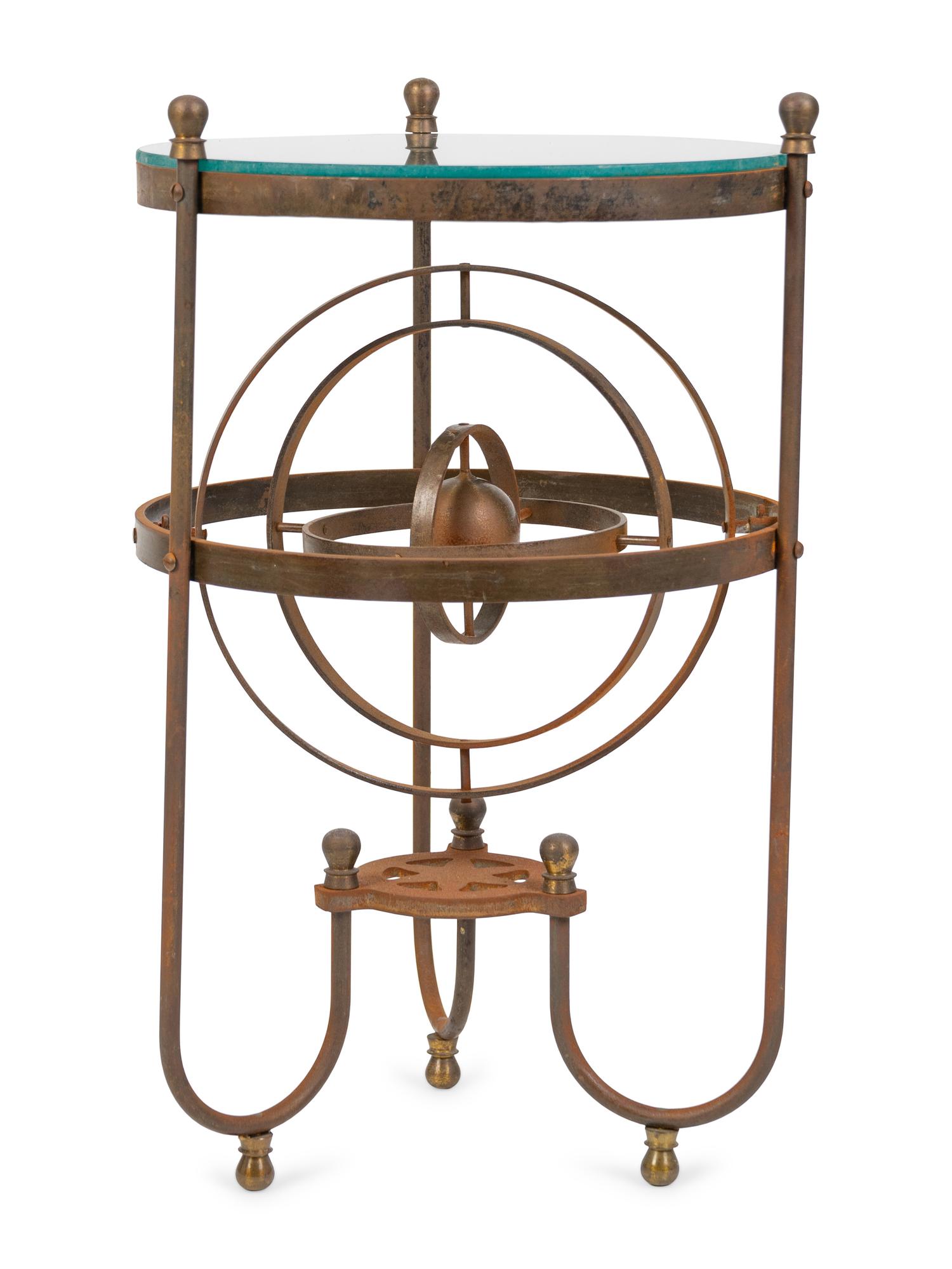 A Wrought Iron Glass-Top Side Table with a Gimbal Stretcher
