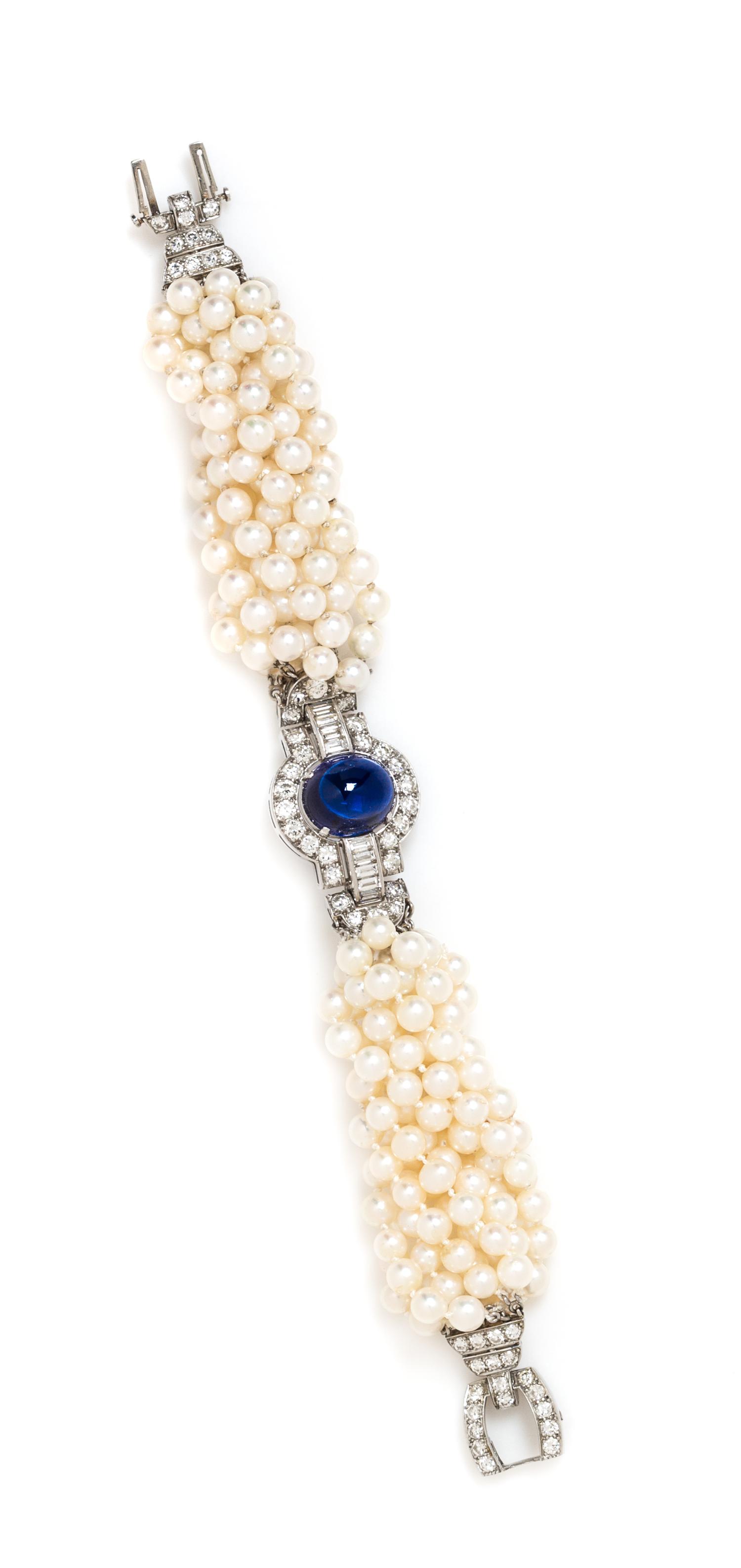 A Platinum, Cultured Pearl, Synthetic Sapphire and Diamond Torsade Bracelet, 29.30 dwts.