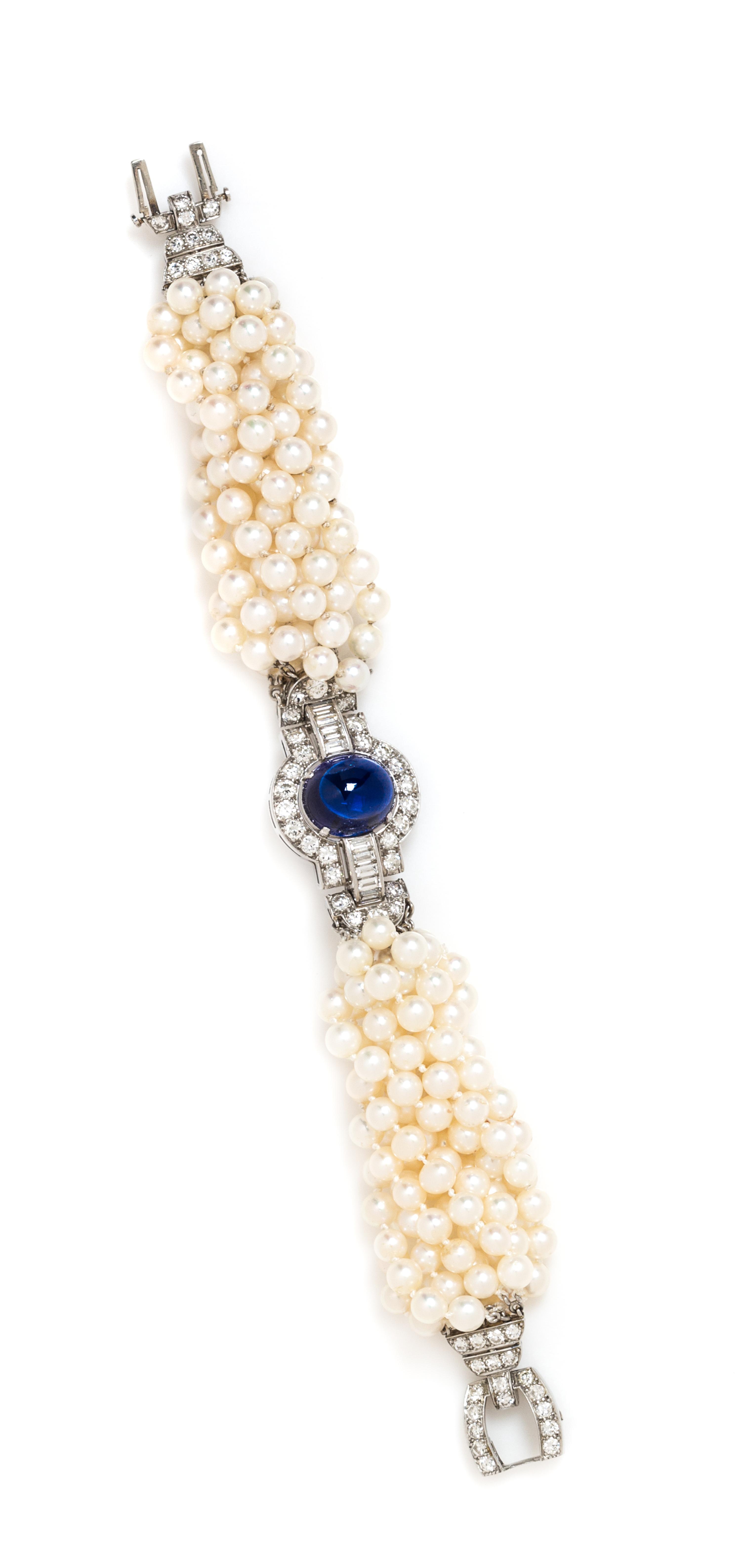 A Platinum, Cultured Pearl, Synthetic Sapphire and Diamond Torsade Bracelet, 29.30 dwts.