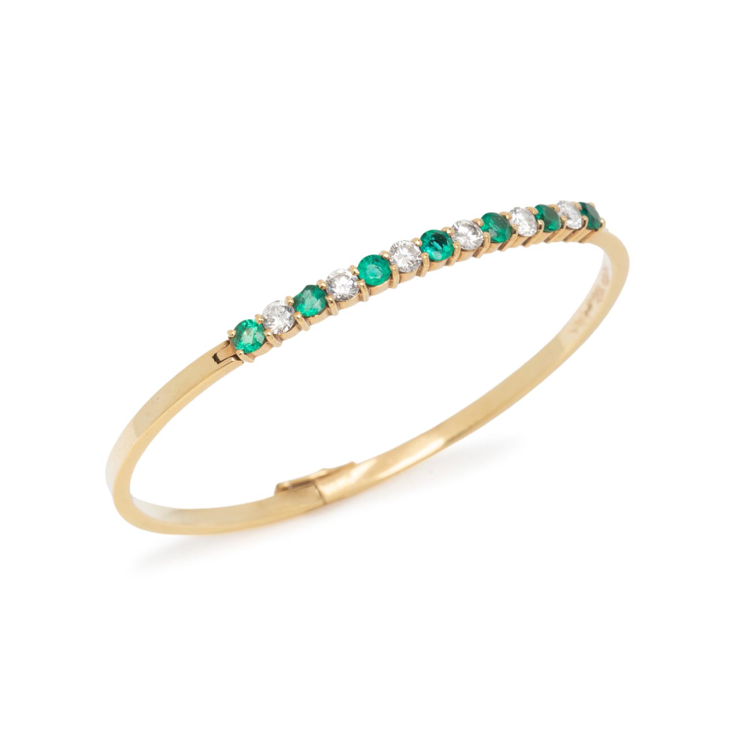 DIAMOND, EMERALD, AND YELLOW GOLD BANGLE BRACELET