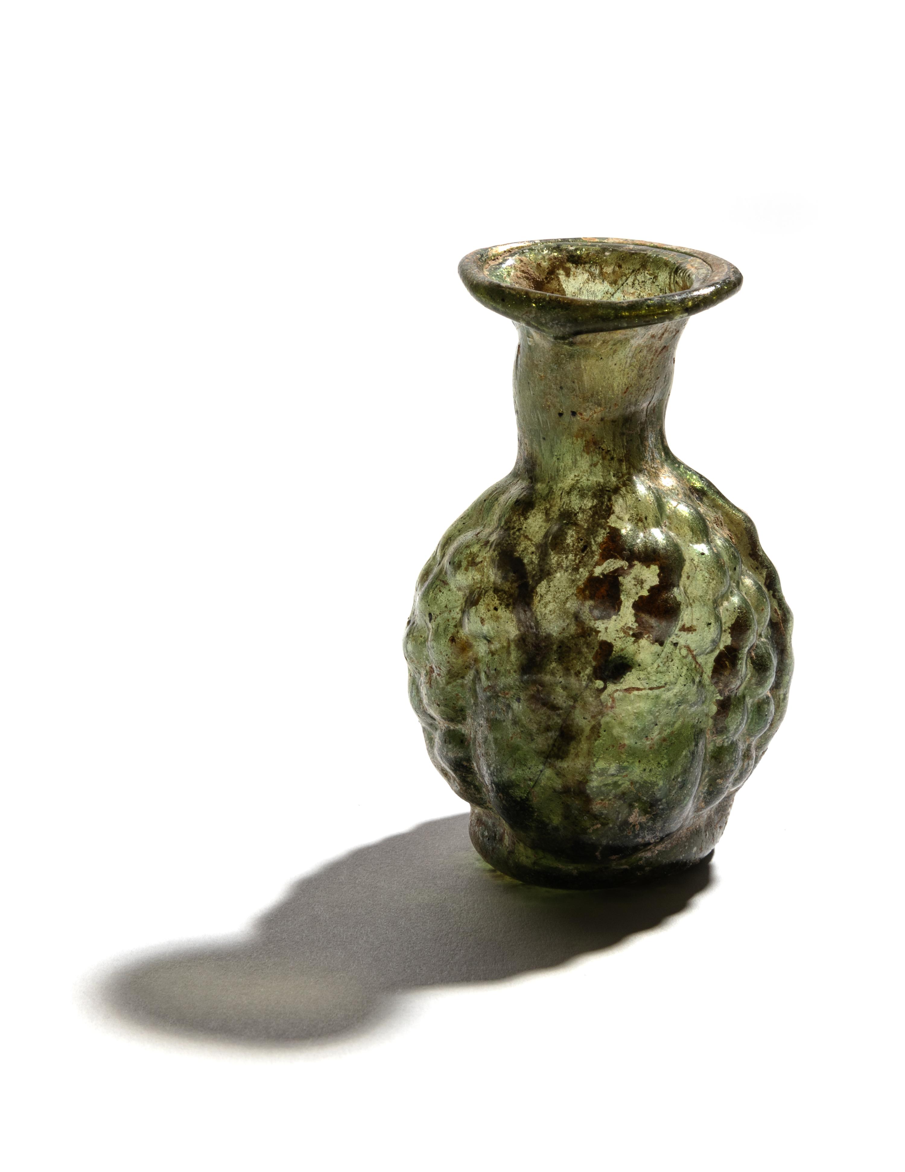 A Roman Glass Double-Head Flask