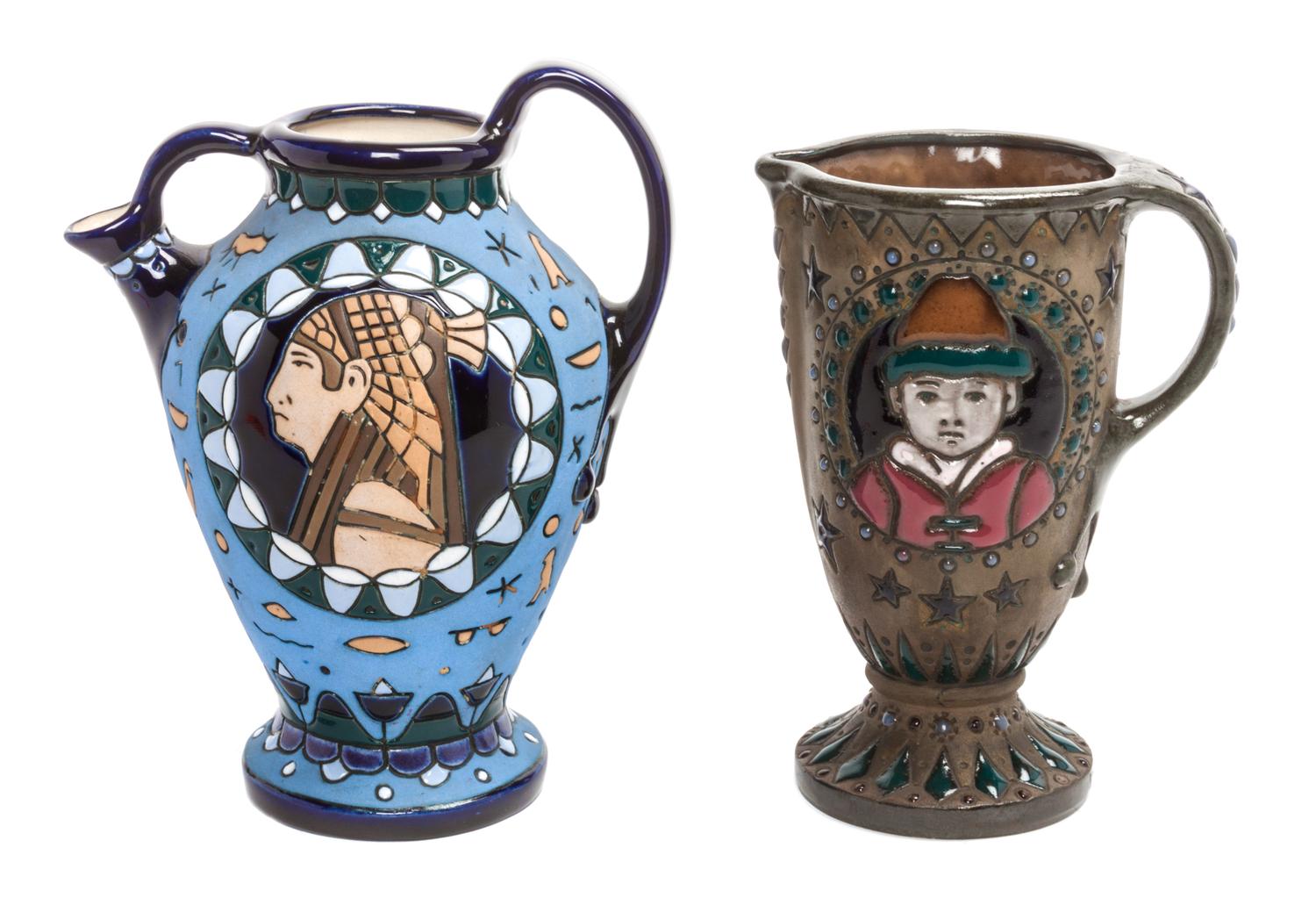 Two Amphora Pottery Pitchers Height of taller 8 3/4 inches.