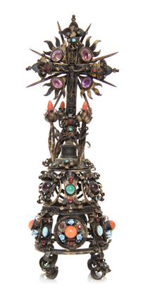 A Continental Silver-Gilt and Jewel Inset Cross, 19th Century, set on a tapering scrollwork base.