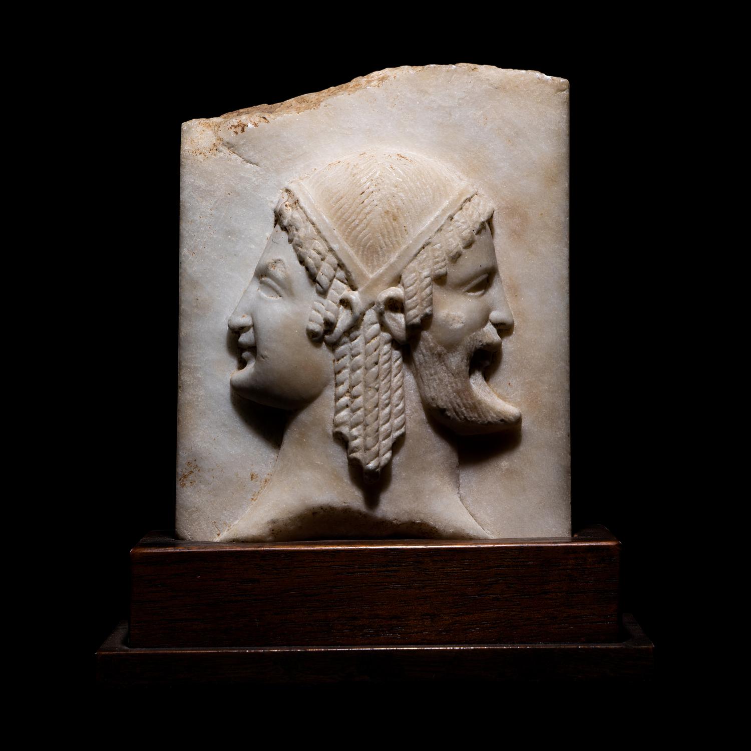 A Neoclassical Marble Relief Fragment with Janus