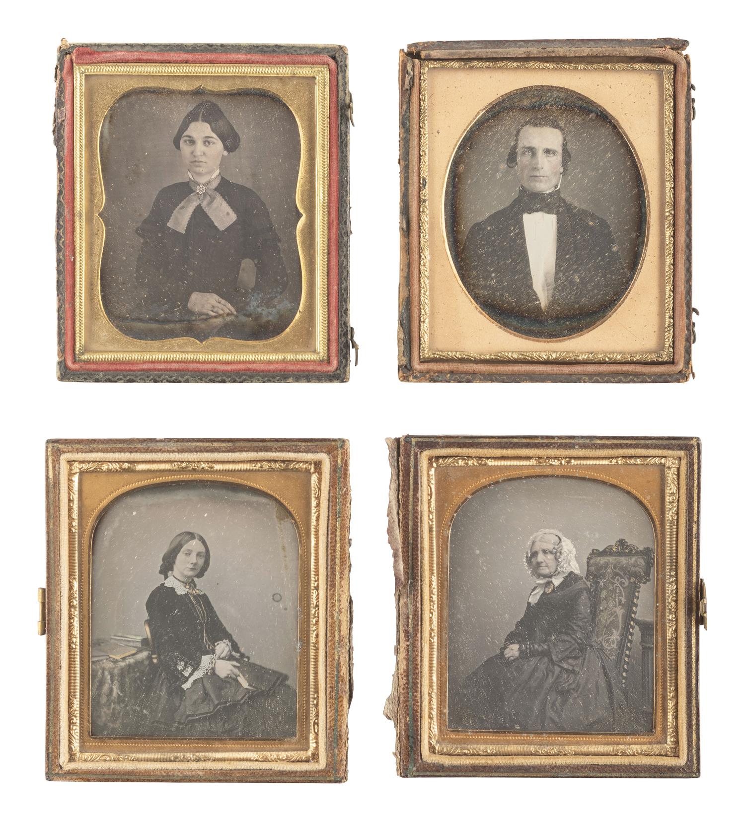 [EARLY PHOTOGRAPHY]. 28 daguerreotypes housed in pairs within side-by-side cases.